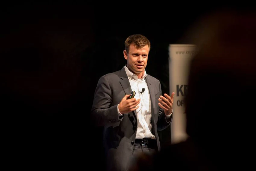 Matthew Michalewicz speaking on stage